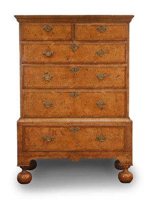 Lot 506 - A walnut chest on stand