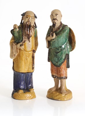 Lot 84 - Two Chinese pottery glazed figures