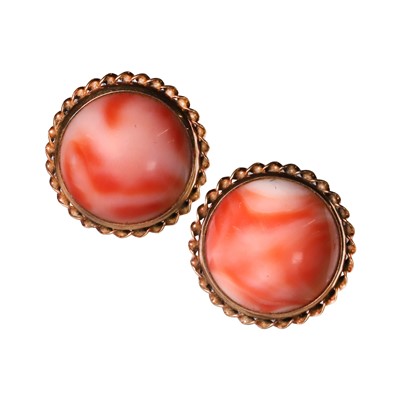 Lot 100 - A pair of angel skin coral stud earrings