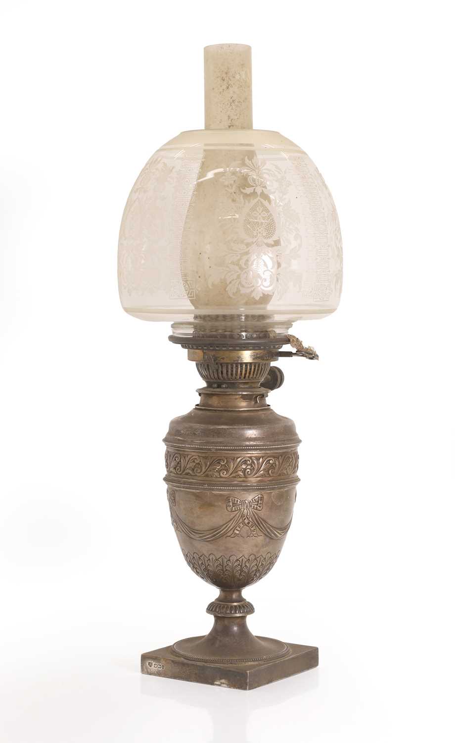 Lot 6 - A silver cased oil lamp