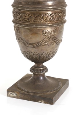 Lot 6 - A silver cased oil lamp
