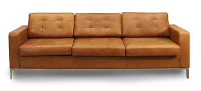 Lot 540 - A chrome and tan leather three seater settee