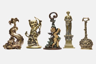 Lot 122 - A collection of five doorstops