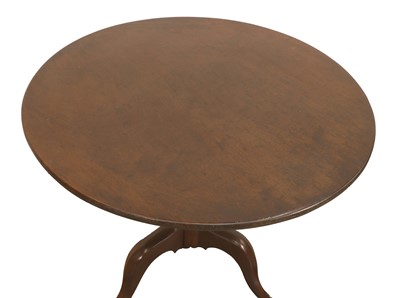 Lot 519 - A George III plum pudding mahogany tripod table