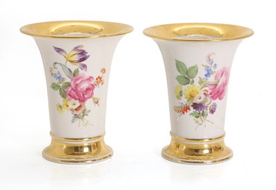 Lot 103 - A pair of porcelain bud vases