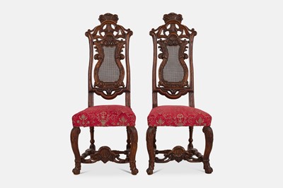 Lot 138 - A pair of carved walnut side chairs