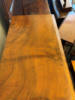 Lot 509 - A walnut open bookcase