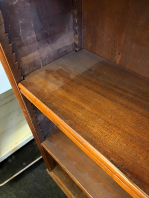 Lot 509 - A walnut open bookcase