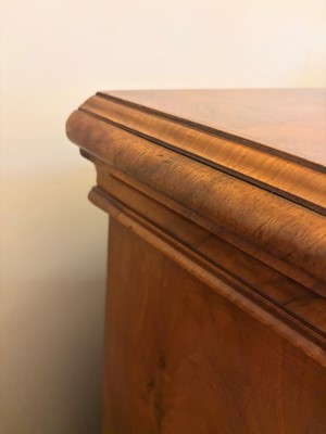 Lot 509 - A walnut open bookcase