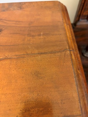 Lot 509 - A walnut open bookcase