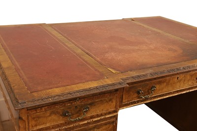 Lot 522 - A pair of George III style walnut partners desks