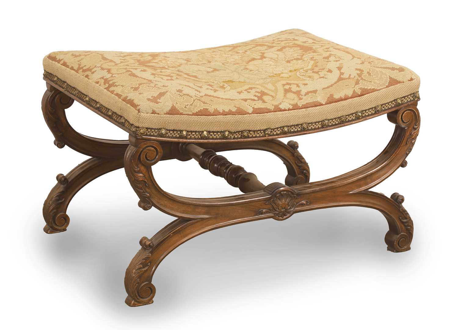 Lot 525 - A Victorian saddle seated stool