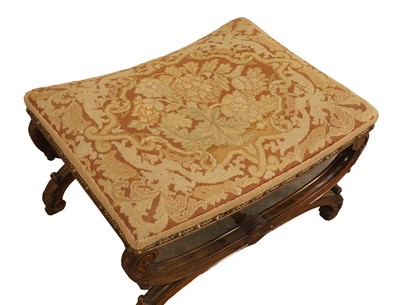 Lot 525 - A Victorian saddle seated stool