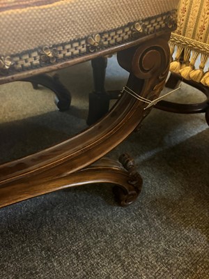 Lot 525 - A Victorian saddle seated stool