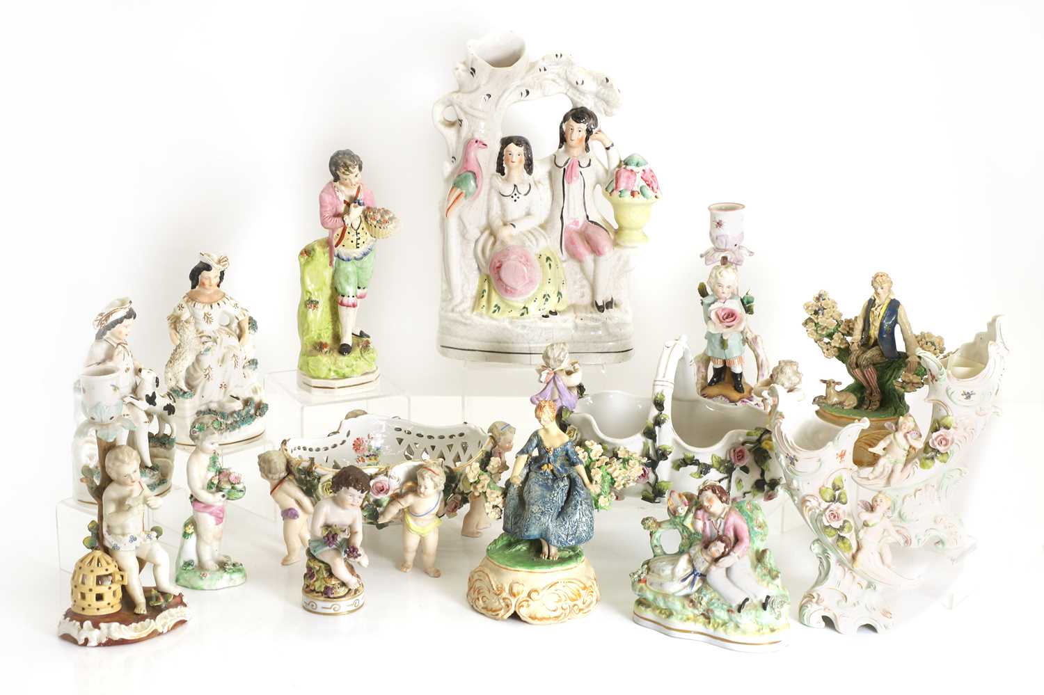 Lot 104 - A large collection of Staffordshire figures
