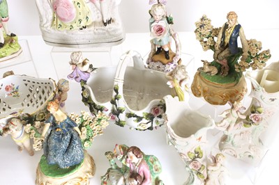 Lot 104 - A large collection of Staffordshire figures