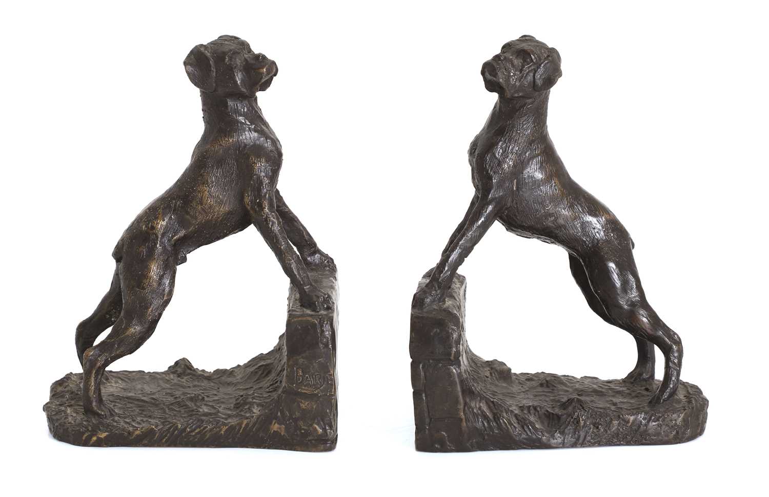 Lot 252 - A pair of bronze bookends