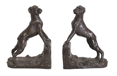 Lot 252 - A pair of bronze bookends