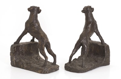 Lot 252 - A pair of bronze bookends
