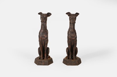 Lot A pair of patinated cast iron whippets