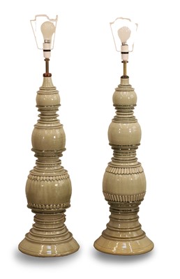 Lot 476 - Two Asian style green glazed lamps