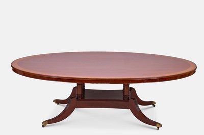 Lot 298 - A Regency-style mahogany and rosewood dining table