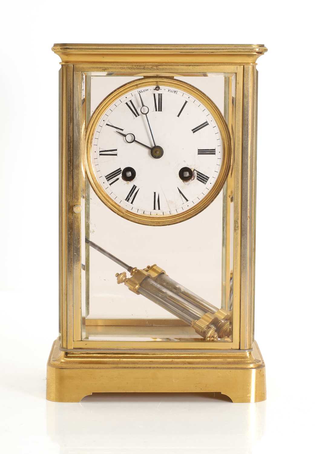 Lot 210 - A French four glass mantel clock