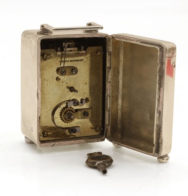 Lot 31 - A silver cased carriage clock