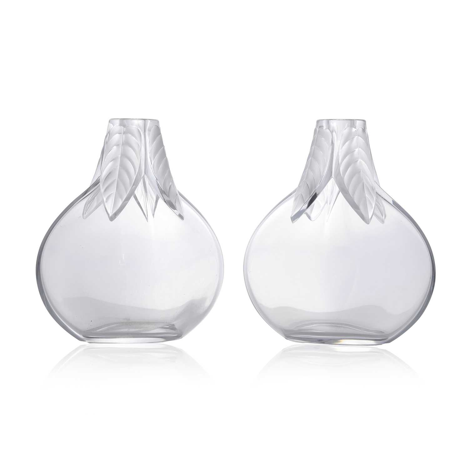 Lot 153 - A pair of Lalique 'Osumi' pattern vases