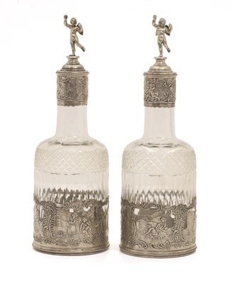 Lot 39 - A pair of glass and silver mounted decanters
