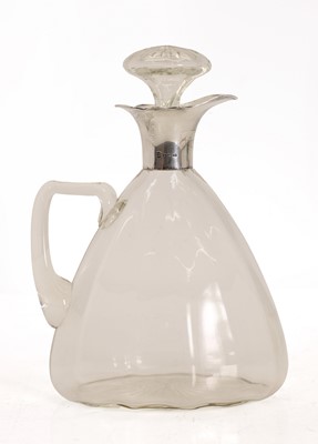 Lot 34 - A George V silver mounted ewer