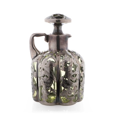 Lot 112 - A Gorham silver-overlaid glass decanter
