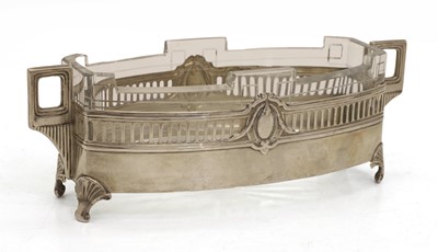Lot 36 - A German silver and glass twin-handled dish