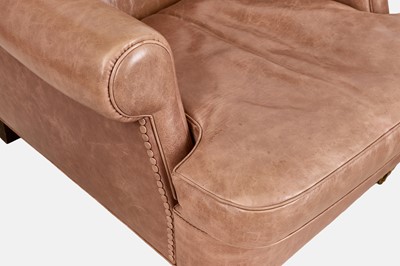 Lot 81 - A pair of leather armchairs by Baxter