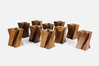 Lot 387 - A group of ten modernist brass bookends