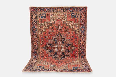 Lot 218 - A Heriz wool carpet