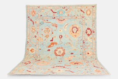 Lot An Oushak wool carpet
