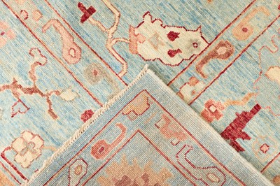 Lot 70 - An Oushak wool carpet