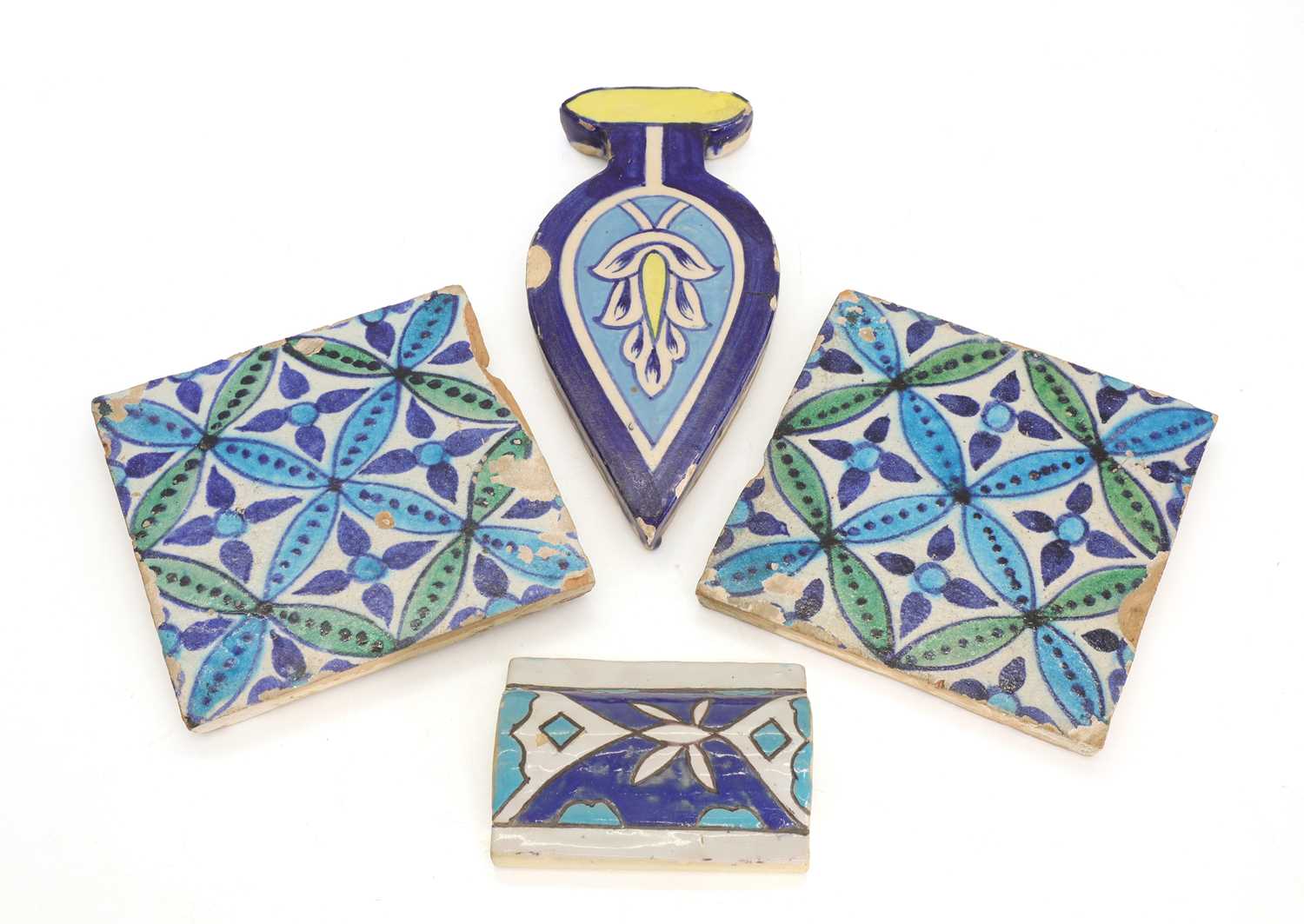 Lot 68 - Two Multan cobalt-blue, turquoise and green glazed pottery tiles