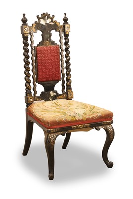 Lot 519 - A Victorian ebonised and mother of pearl inlaid nursing chair