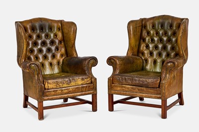 Lot 253 - A pair of Victorian-style leather wing armchairs