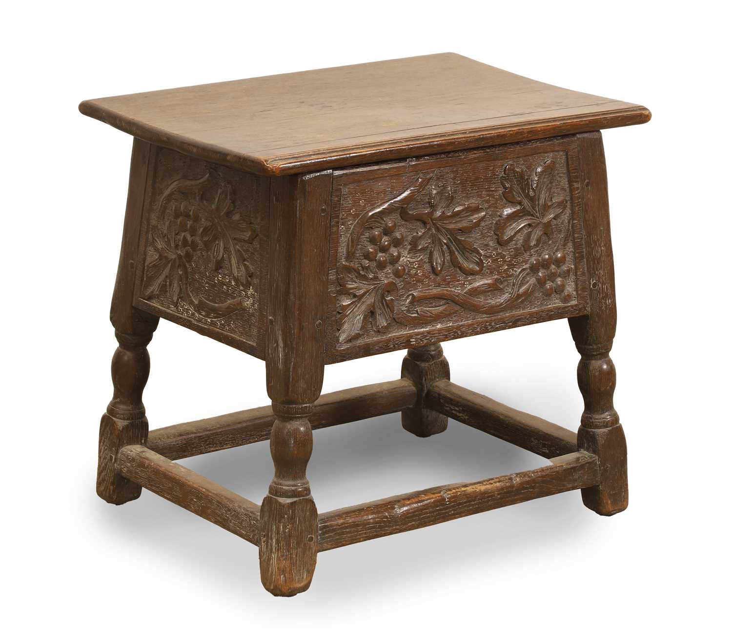 Lot 515 - A carved oak coal box