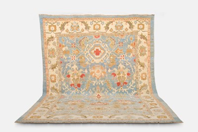 Lot 358 - An Oushak wool carpet