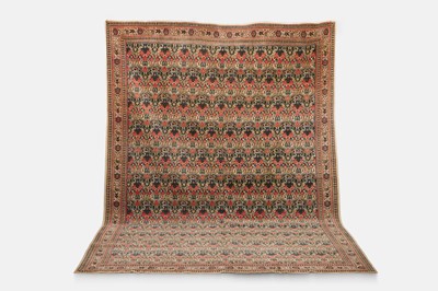 Lot 323 - A Qum wool carpet