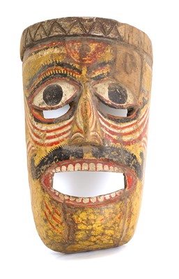 Lot 311 - An Asian Nasik wooden carved mask