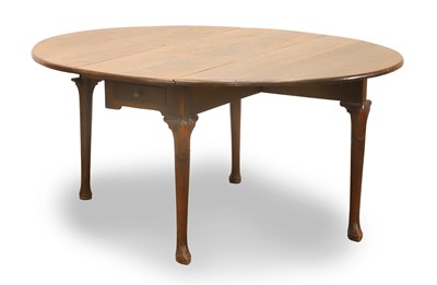 Lot 503 - A George II oak drop flap table
