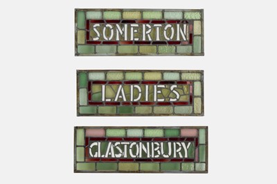 Lot 225 - A set of three stained-glass panels