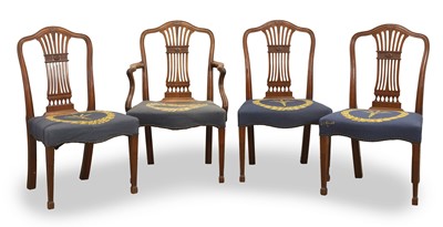 Lot 517 - A set of four Hepplewhite mahogany dining chairs