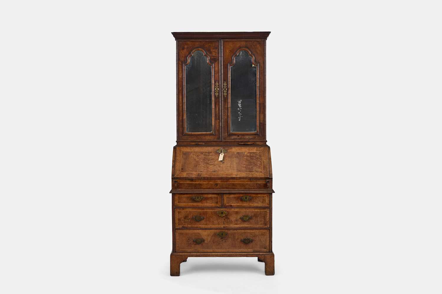 Lot 242 - A Queen Anne walnut bureau bookcase