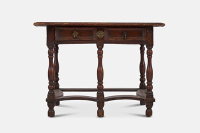 Lot 248 - A Charles II fruitwood and pine side table